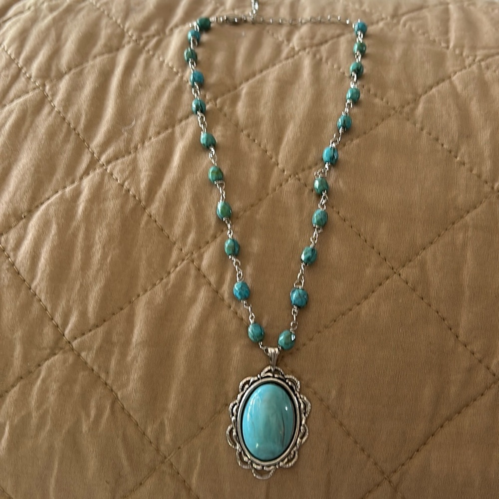 Costume Turquoise Necklace with turquoise large stone hanging.